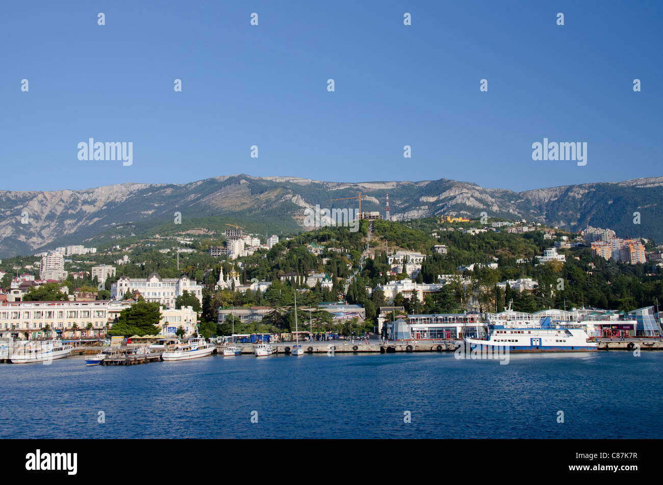 Ukraine, Yalta. Black Sea view of the port of Yalta with the Crimean