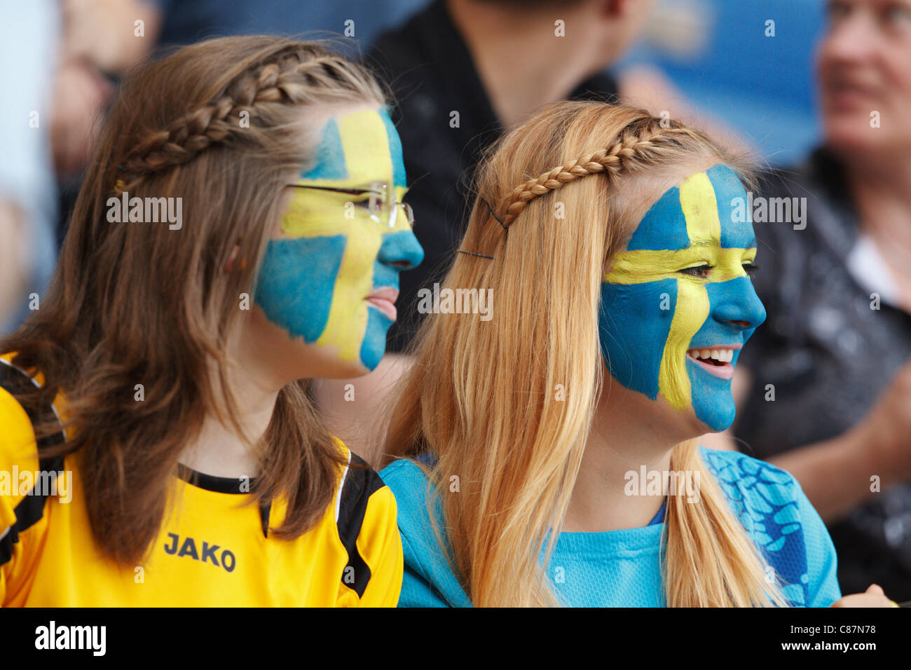 Young Sweden supporters watch the action at the 2011 FIFA Women's World Cup third place match between France and Sweden. Stock Photo