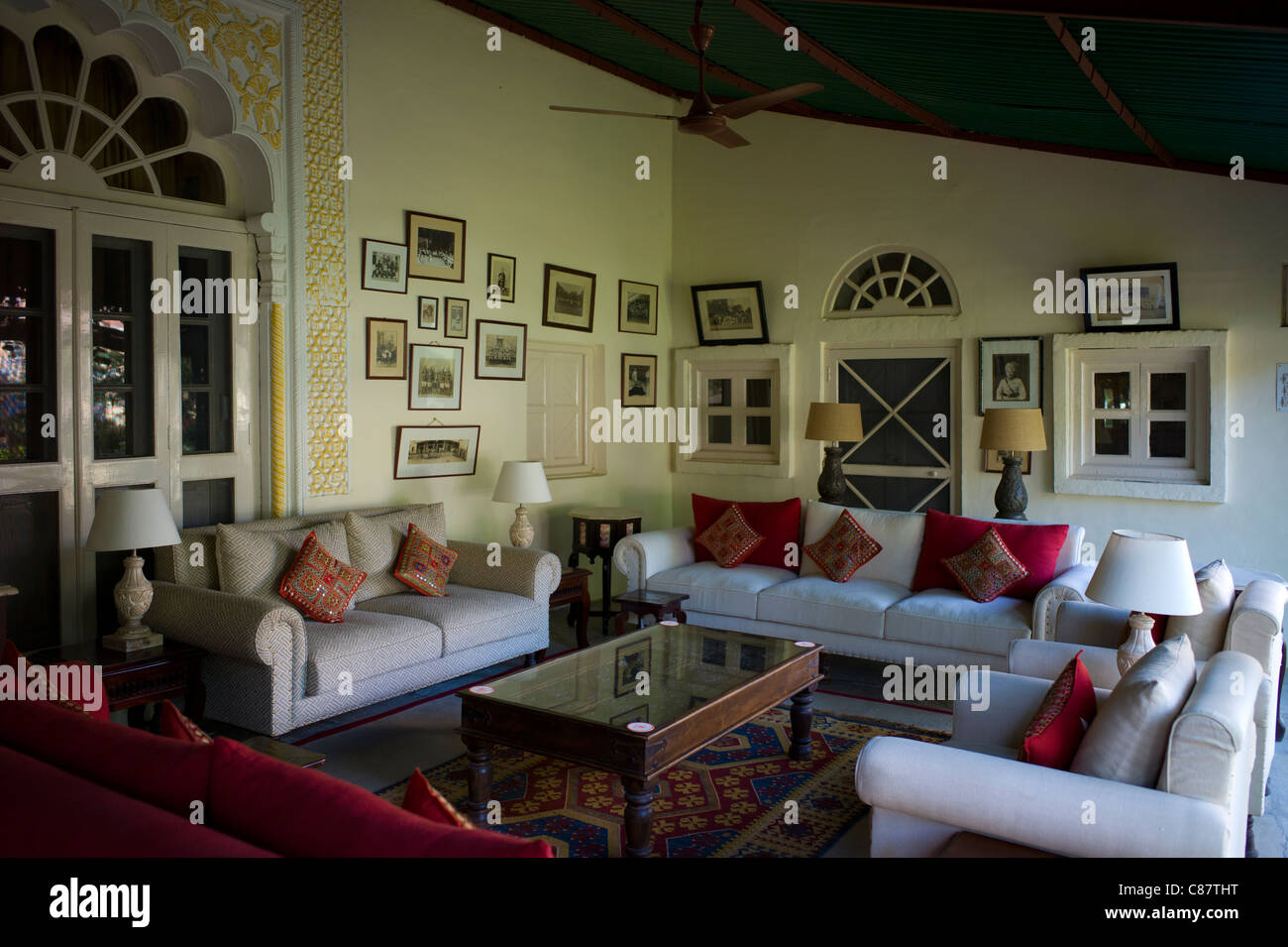 Rohet Garh fortress palace hotel salon drawing room with photographs of aristocratic ancestors Rohet, Rajasthan, India Stock Photo