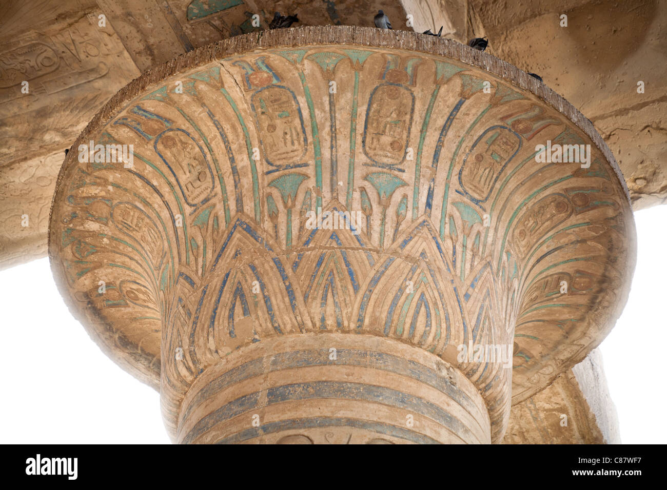 Close up of painted capital head at the Ramesseum, Mortuary Temple of Ramesses II on West Bank of the Nile at Luxor, Egypt Stock Photo