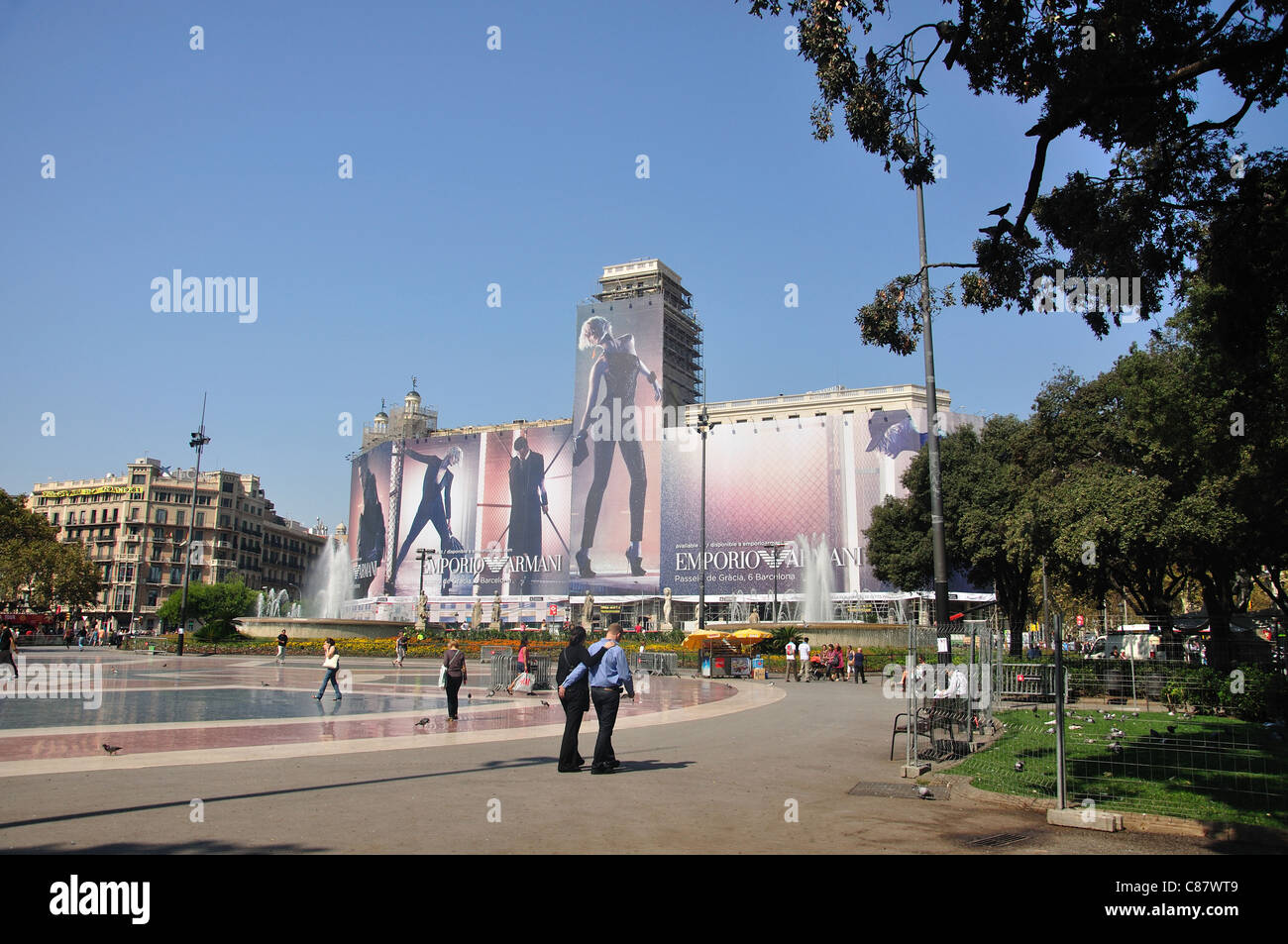 Advertising hoarding covering scaffolding, Plaça Catalunya, Barcelona, Province of Barcelona, Catalonia, Spain Stock Photo