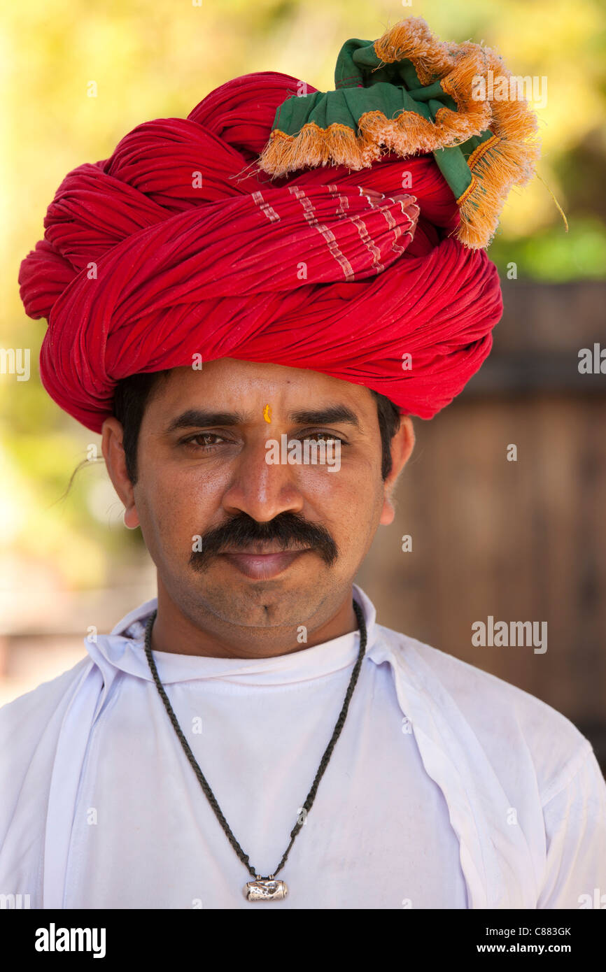 Young Indian man with traditional Rajasthani turban in Narlai village
