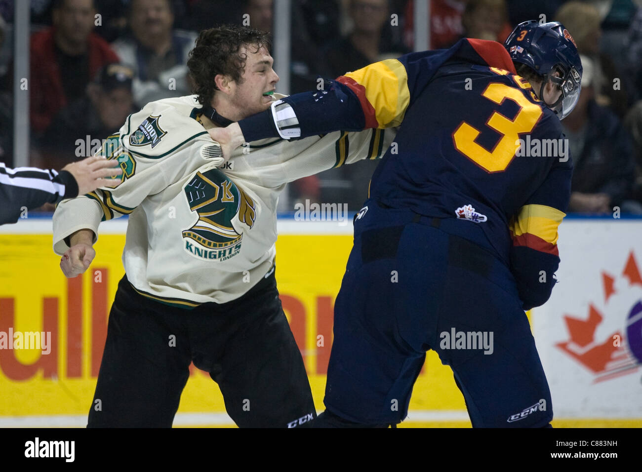 London Ontario, Canada - October 14, 2011. Matt Rupert of the London  Knights, left, dukes it out with Brett Cook of the Erie Otters. London won  the game 6-4 Stock Photo - Alamy