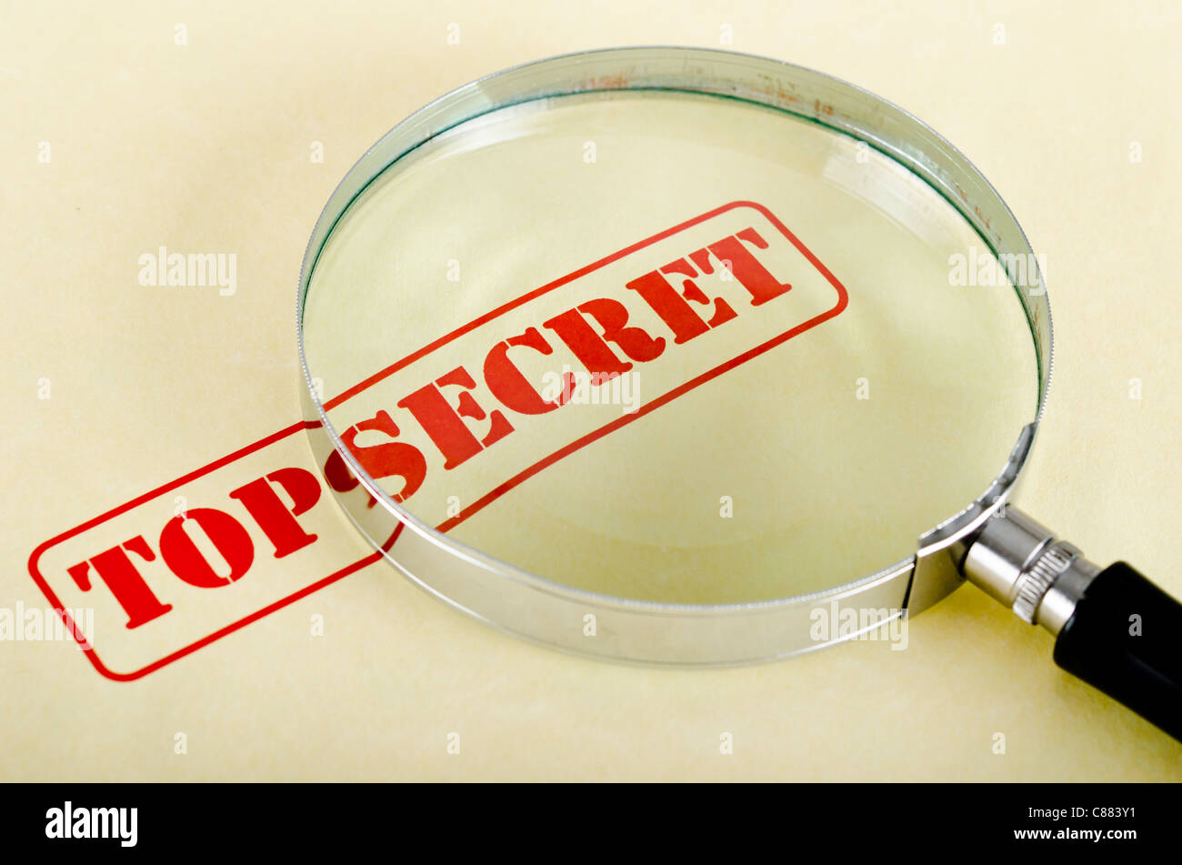 magnifying glass is on top secret inscription Stock Photo Alamy