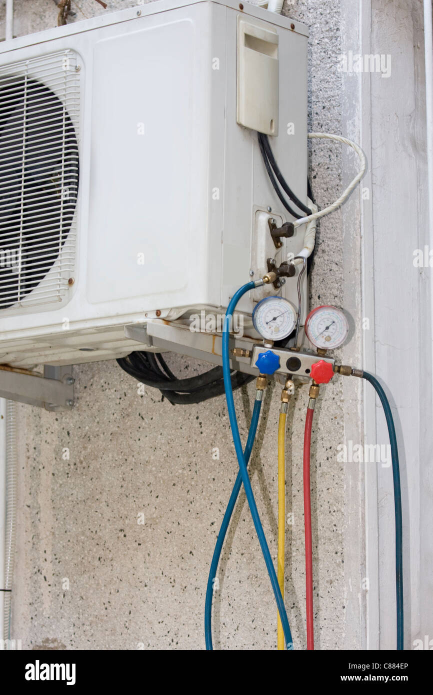 testing A residential central air conditioning unit Stock Photo