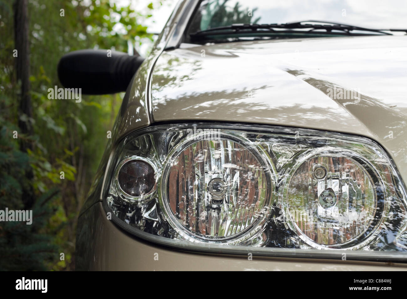 Detail of modern European car headlight. Stock Photo