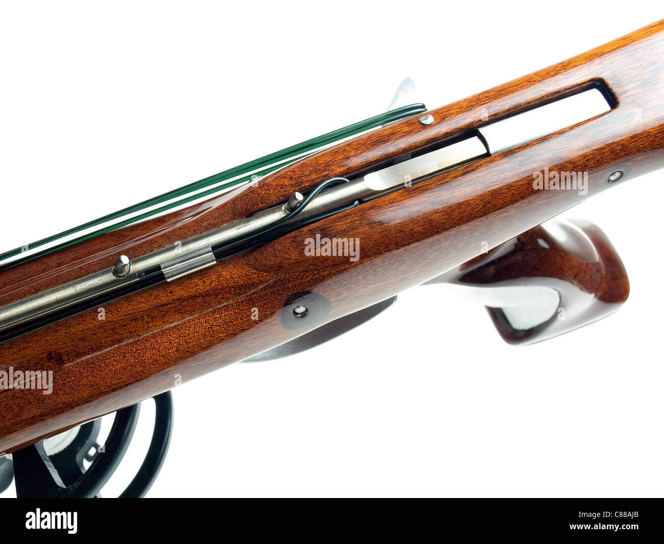 https://c8.alamy.com/comp/C88AJB/closeup-view-of-wooden-speargun-and-trigger-mechanism-on-a-white-background-C88AJB.jpg