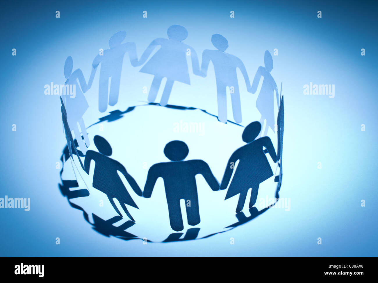 Paper Dolls Holding Hands Around The World