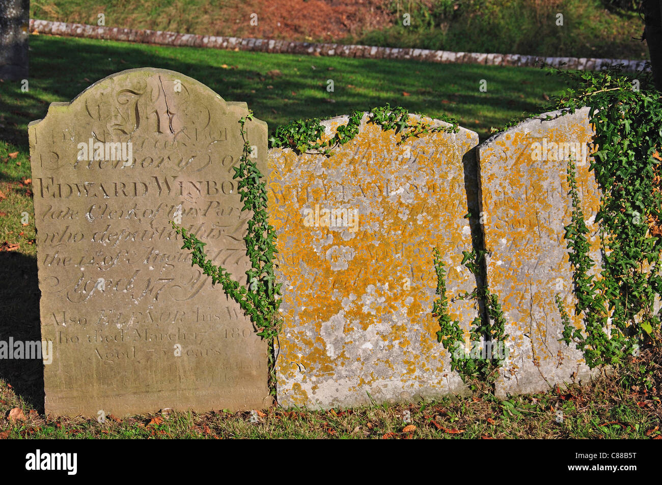 Ancient headstones in churchyard of The Parish Church of St.Mary's, Church Gate, Thatcham, Berkshire, England, United Kingdom Stock Photo