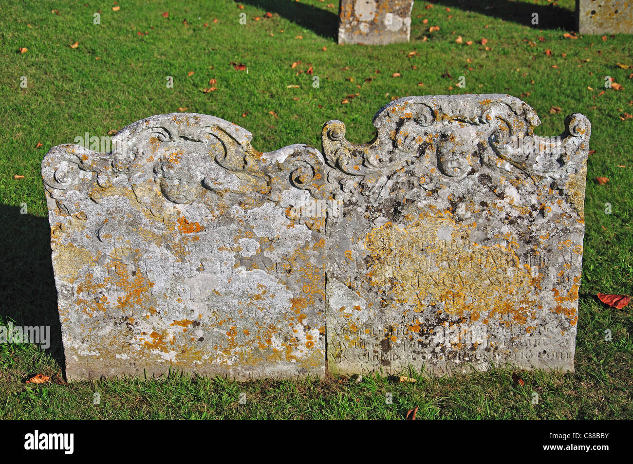 Ancient headstones in churchyard of The Parish Church of St.Mary's, Church Gate, Thatcham, Berkshire, England, United Kingdom Stock Photo