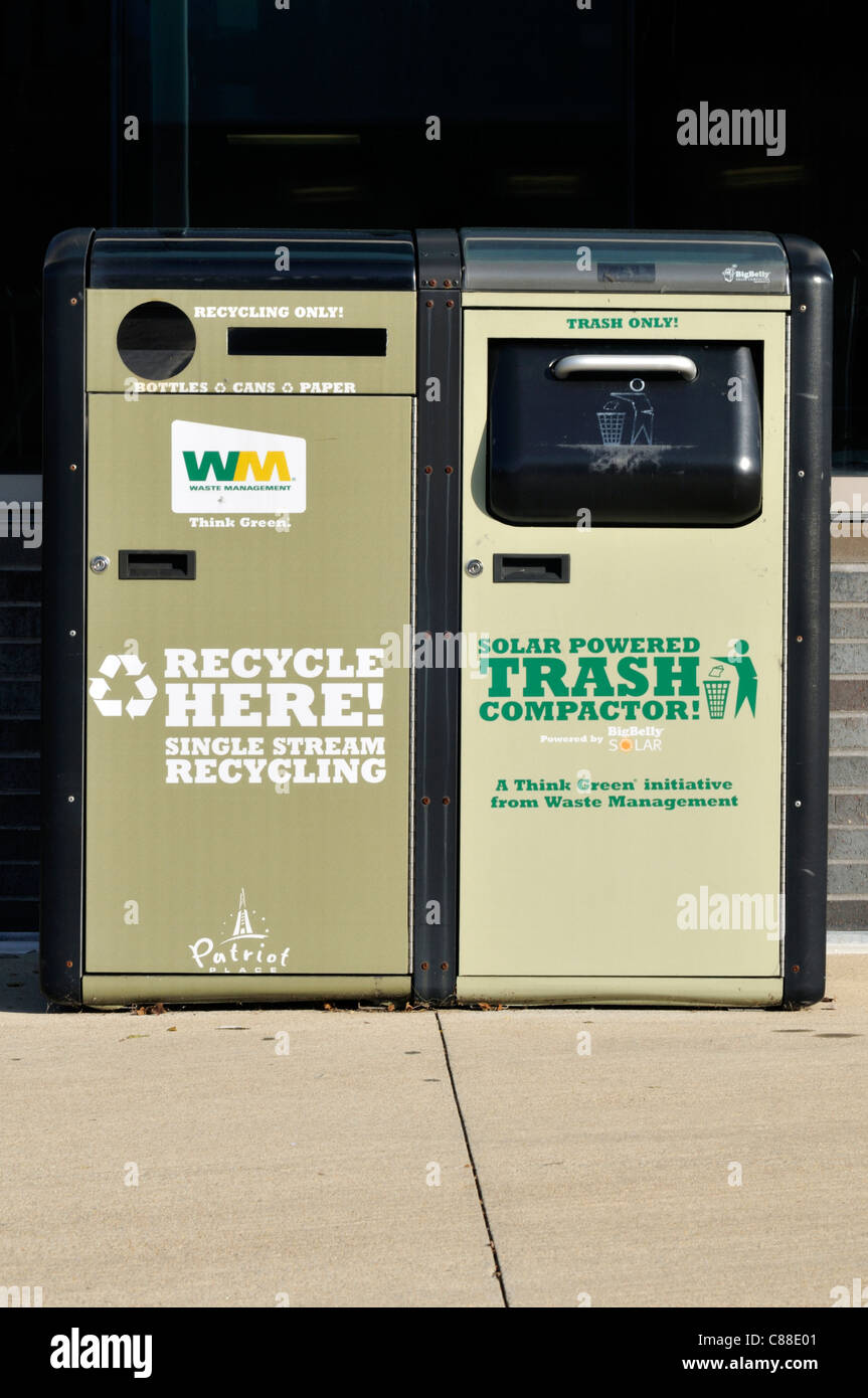 Recycling machine and a solar powered trash compactor outside USA. Stock Photo