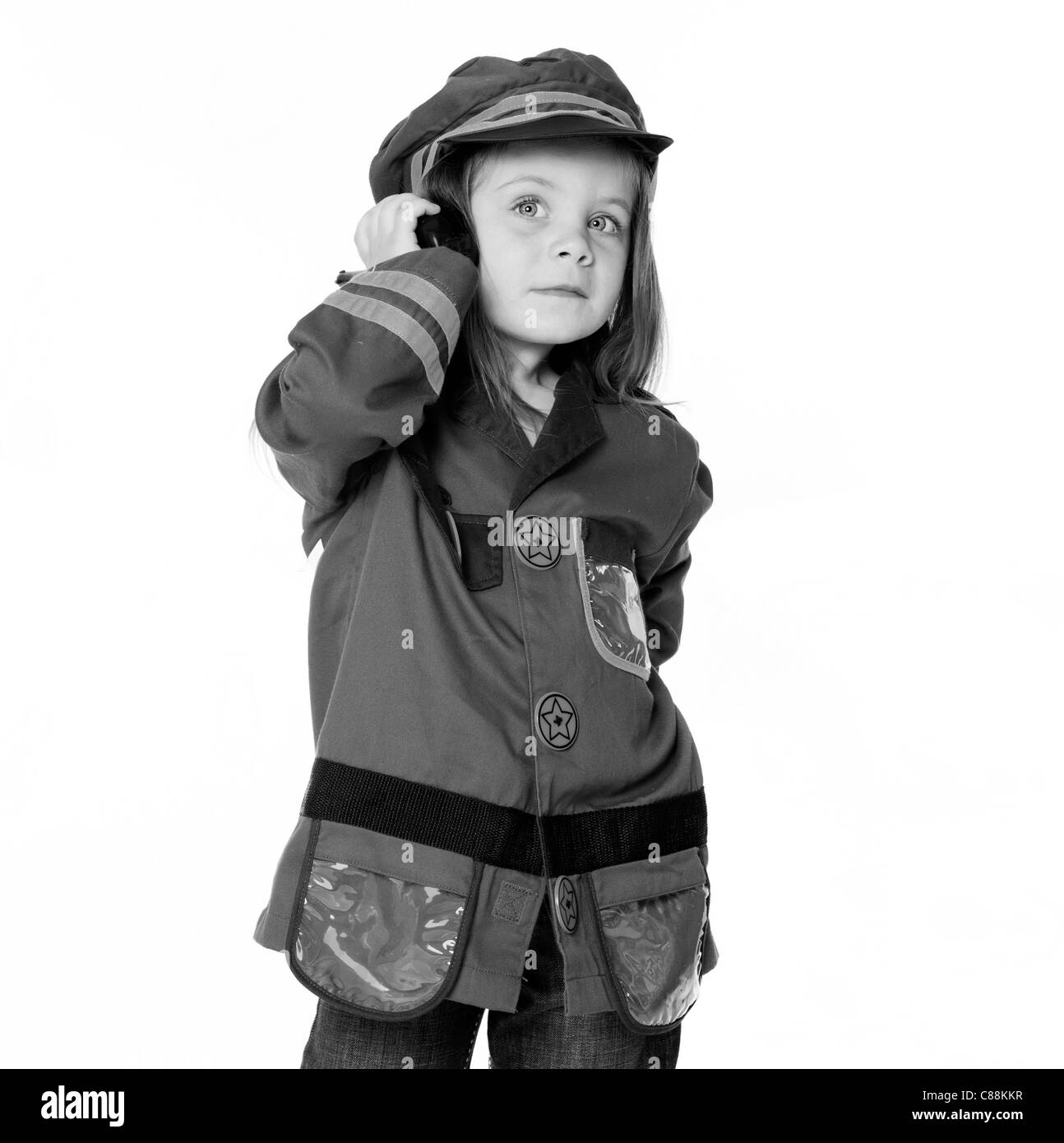 Little Girl in Police Costume Stock Photo
