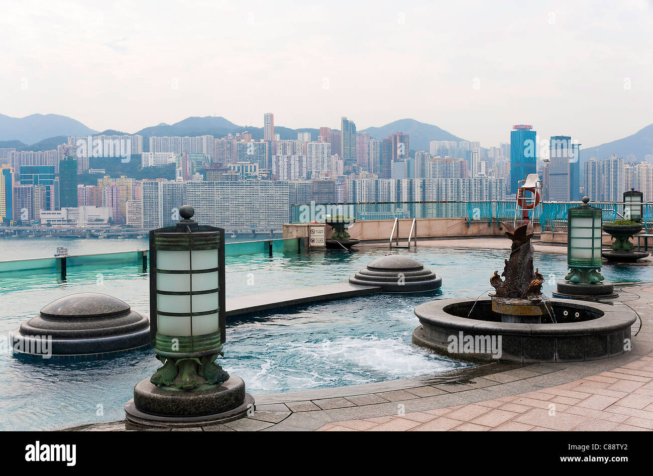 The Rooftop Swimming Pool Of The Harbour Grand Hotel Kowloon With Hong Kong Island In The Background China Asia Stock Photo Alamy