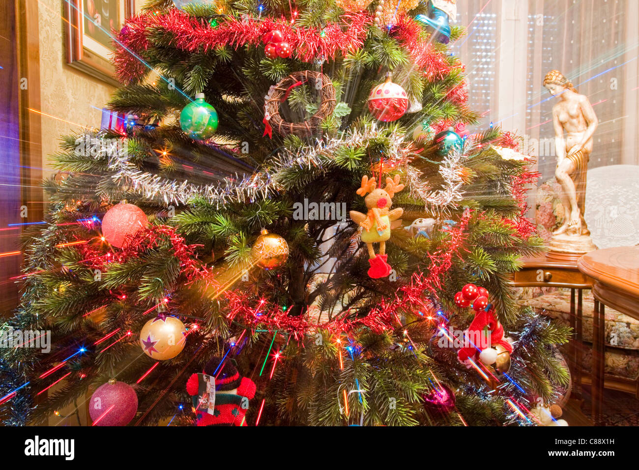 Lighting effect in a Christmas tree as a concept of Christmas is coming Stock Photo