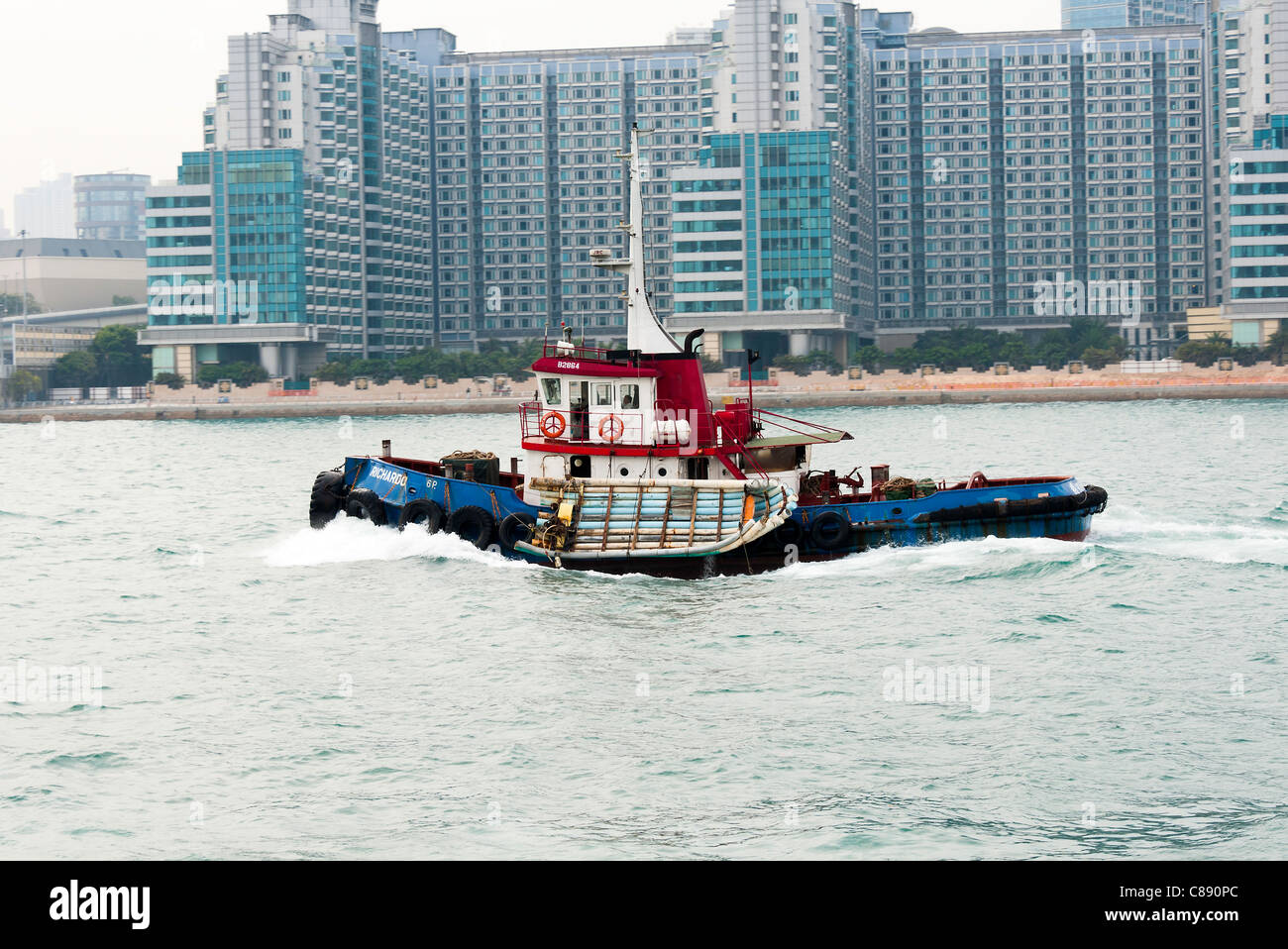 Tugboat Richardo Cruising in Victoria Harbour Kowloon Hong Kong China Asia Stock Photo