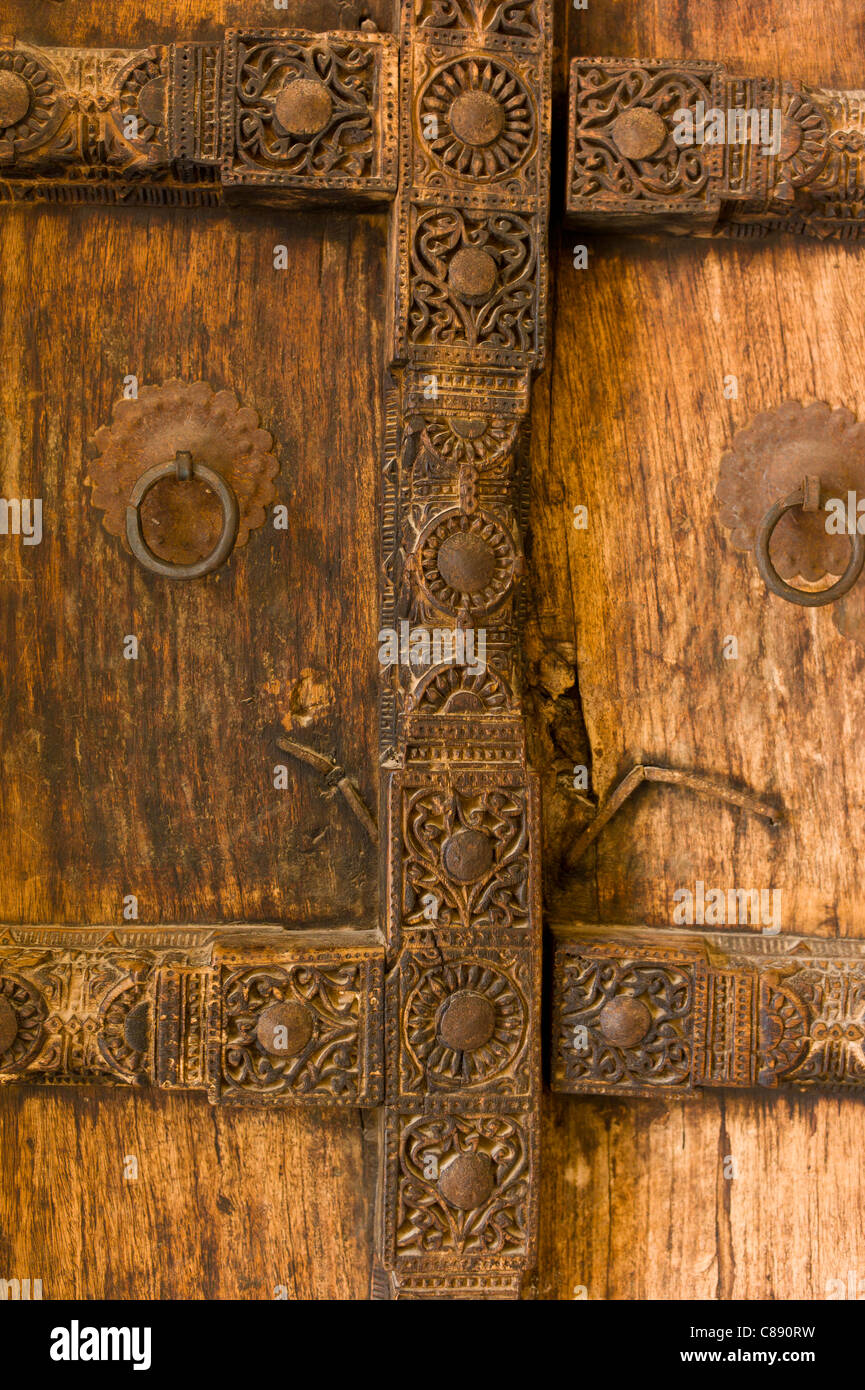 Hindu style traditional door in Acacia wood at the 16th Century Amber
