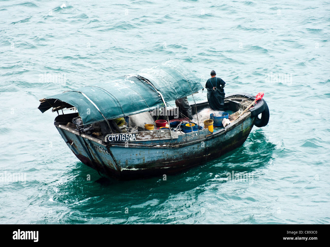 Sampan Style Fishing Boat in Victoria Harbour near Kowloon Hong Kong China Asia Stock Photo