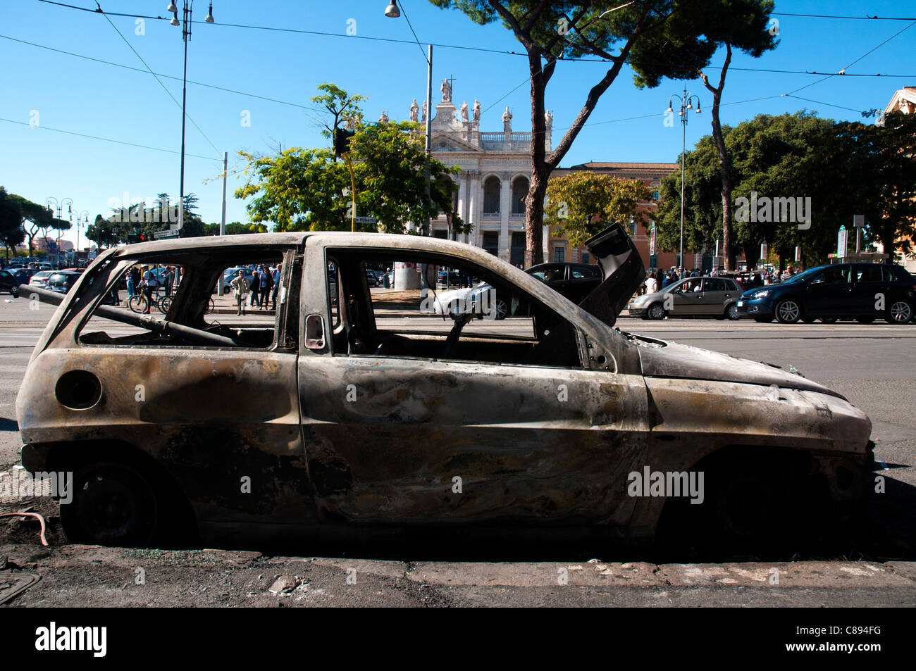 ROME, Italy, 16/10/2011 Torched car after black bloc rampage  during the global 'Day of Rage' Stock Photo