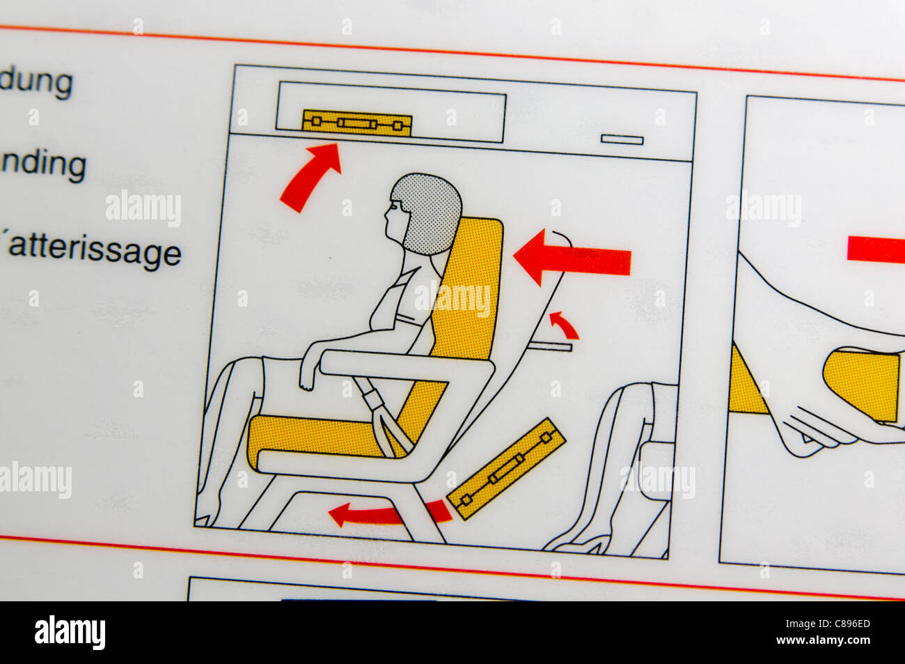 Closeup of an airline safety card showing how to prepare for take-off by putting luggage in the overhead locker or seat in front Stock Photo