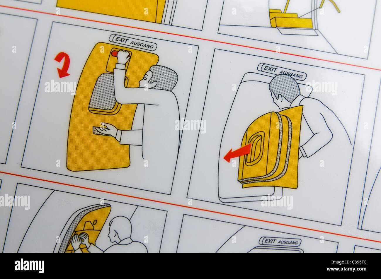 Closeup of an airline safety card showing how to evacuate in the Stock