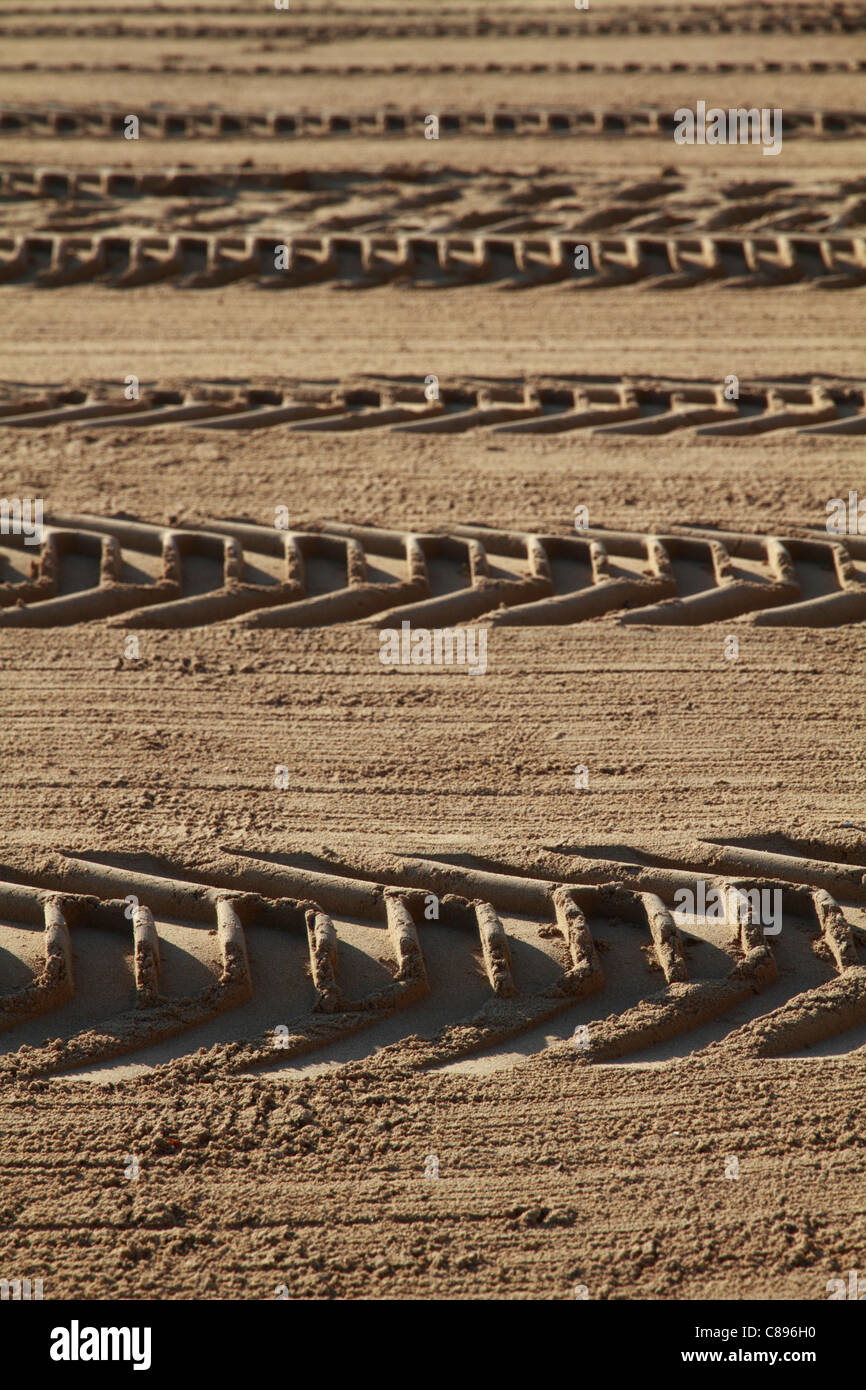 Tyre tracks on sand Stock Photo