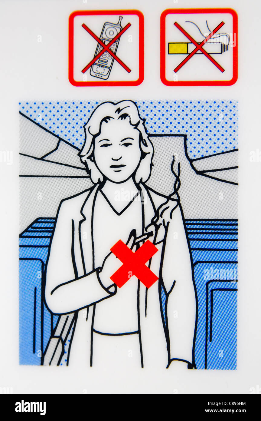 Closeup of an airline safety card warning against smoking on board Stock Photo