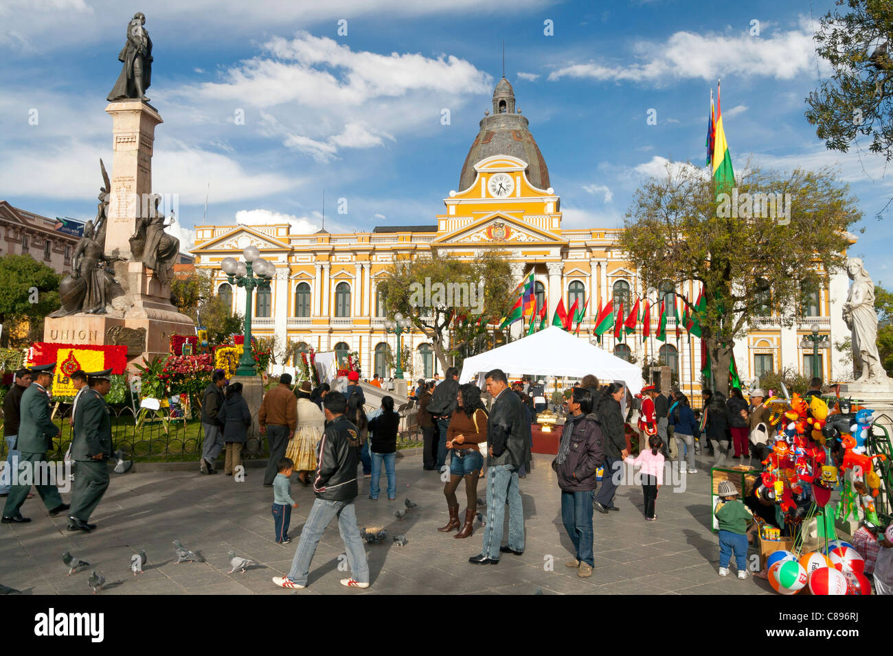 Plaza Murillo, La Paz main square, Bolivia, with loads going on, Congreso nacional in background Stock Photo