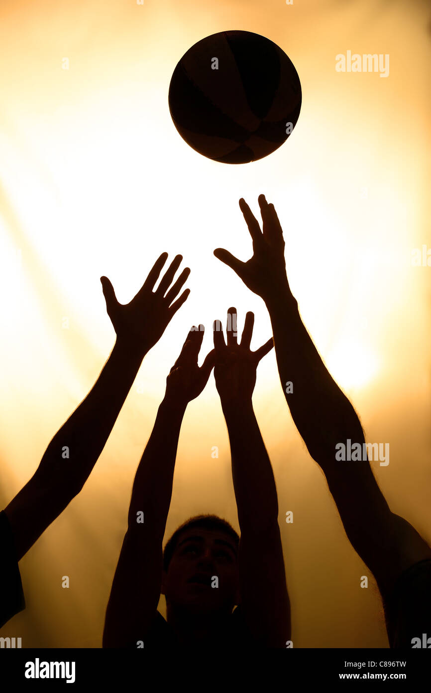 Basketball fight - black silhouettes of players Stock Photo