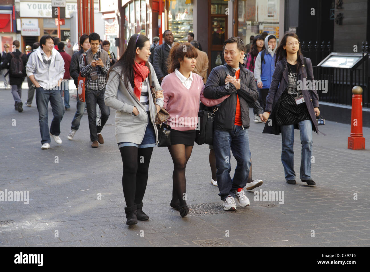 Pedestrians, Gerrard street, London UK Stock Photo
