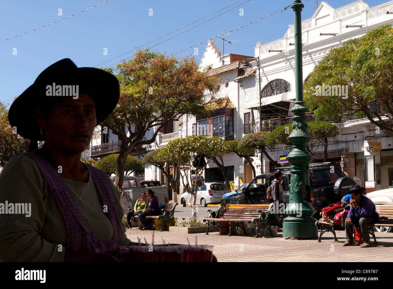 Plaza 25 de Mayo typical view, Sucre old city, Bolivia (UNESCO world heritage), traditional vendor back-exposed Stock Photo