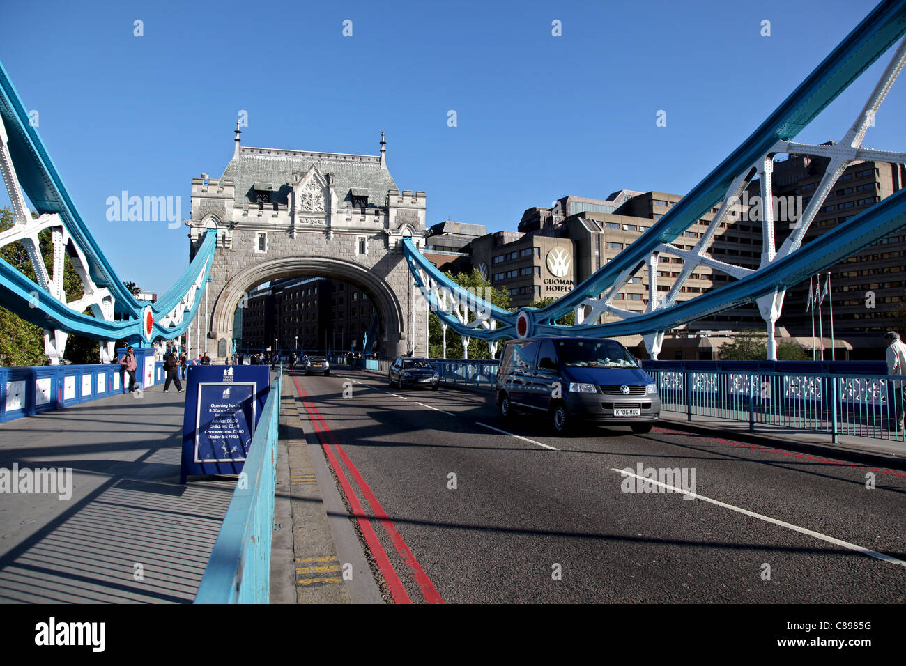The northern section of The Tower Bridge with a car passing by Stock