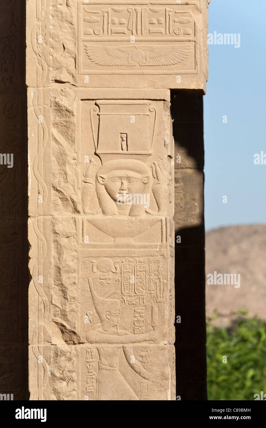 Relief showing finely carved Hathor head at the Temple of Hathor, Temple of Isis at Philae, Aglika Island, Aswan Upper Egypt Stock Photo