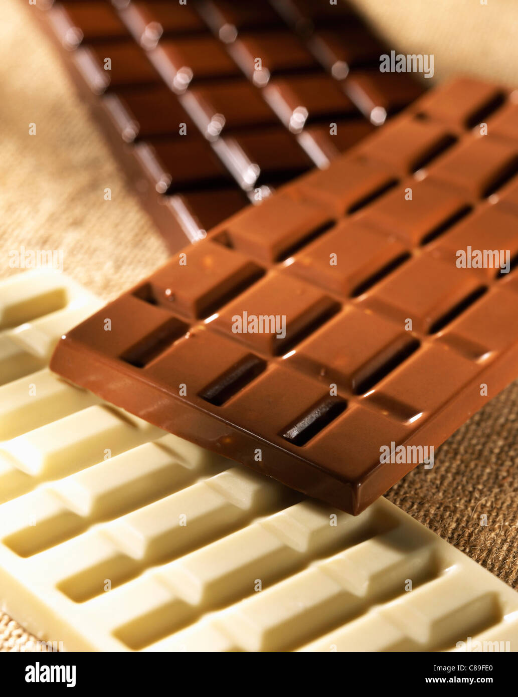 Bars of plain, milk and white chocolate Stock Photo