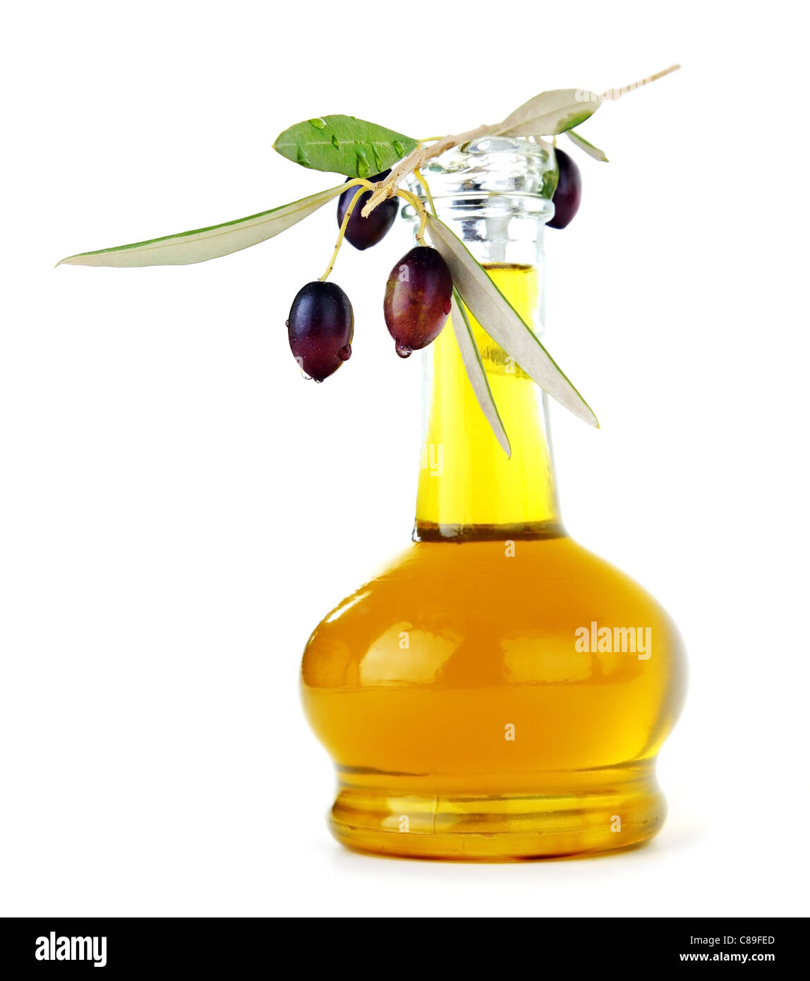 Fresh black olives & olive oil isolated on white background Stock Photo