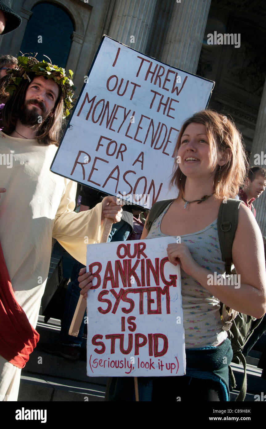 One man dressed as Jesus has a sign saying I threw out the moneylenders for a reason. Stock Photo