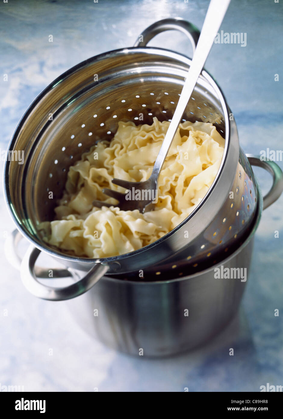 Saucepan strainer hires stock photography and images Alamy