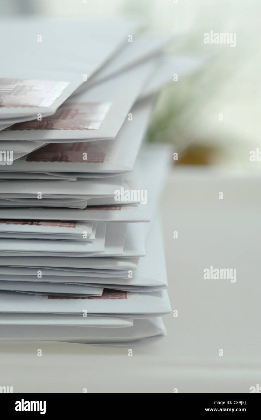 Germany, Stack of letters in envelope at office, close up Stock Photo