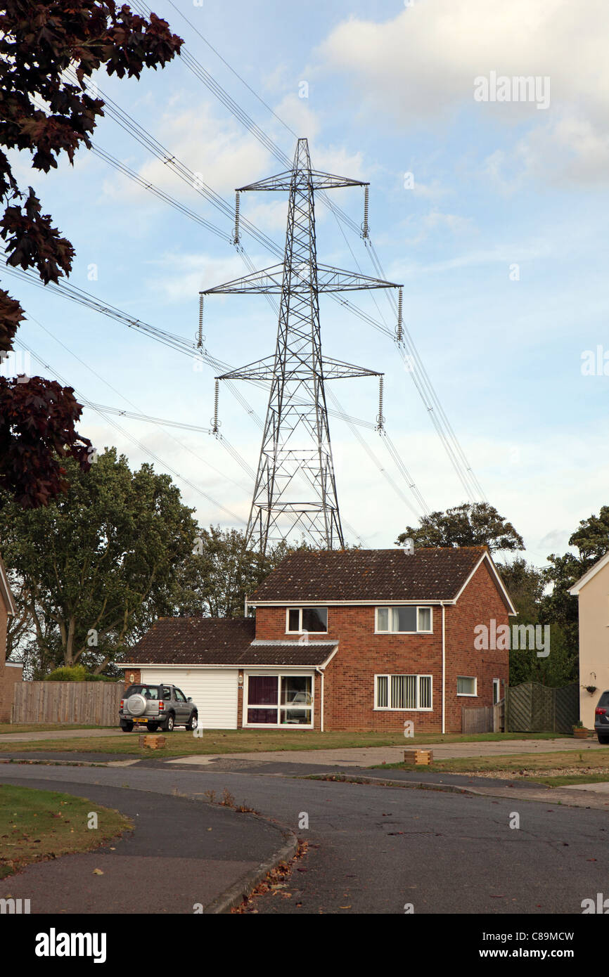 Electricity Pylon behind house, in Suffolk, UK, some research connects