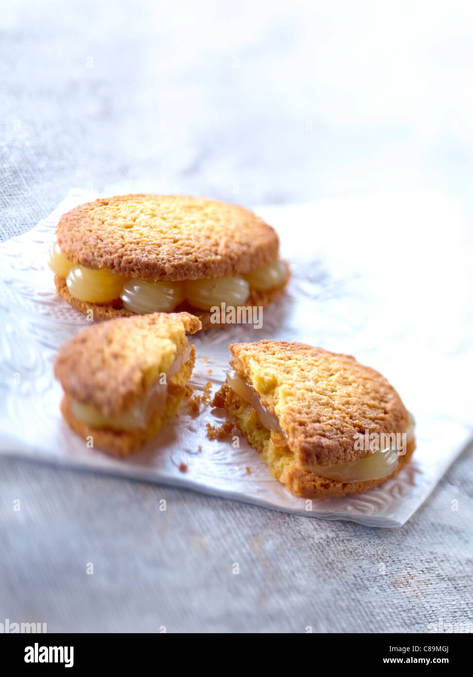 Shortbread cookies filled with lemon curd Stock Photo Alamy