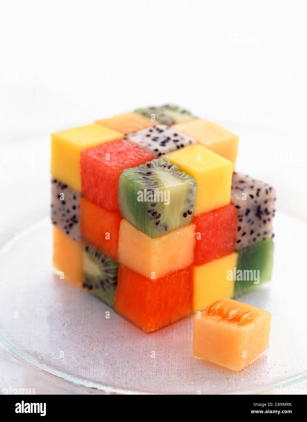Melon and tropical fruit Rubik's cube Stock Photo Alamy