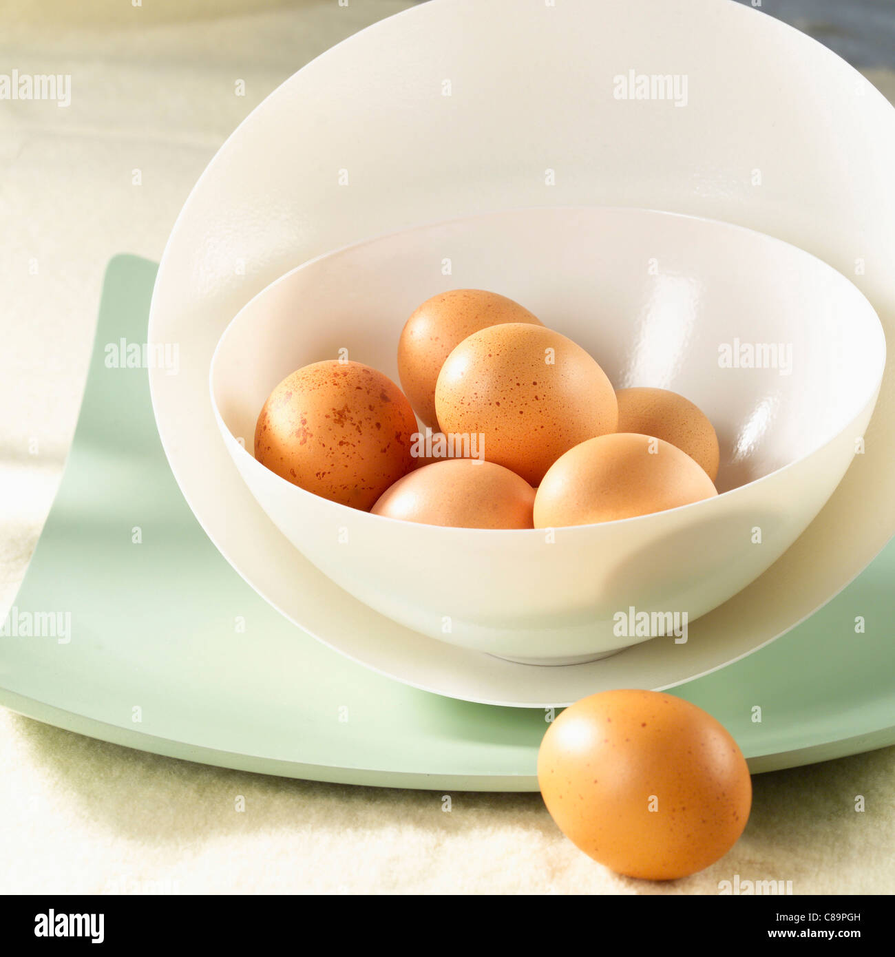 Whole eggs in bowl Stock Photo Alamy