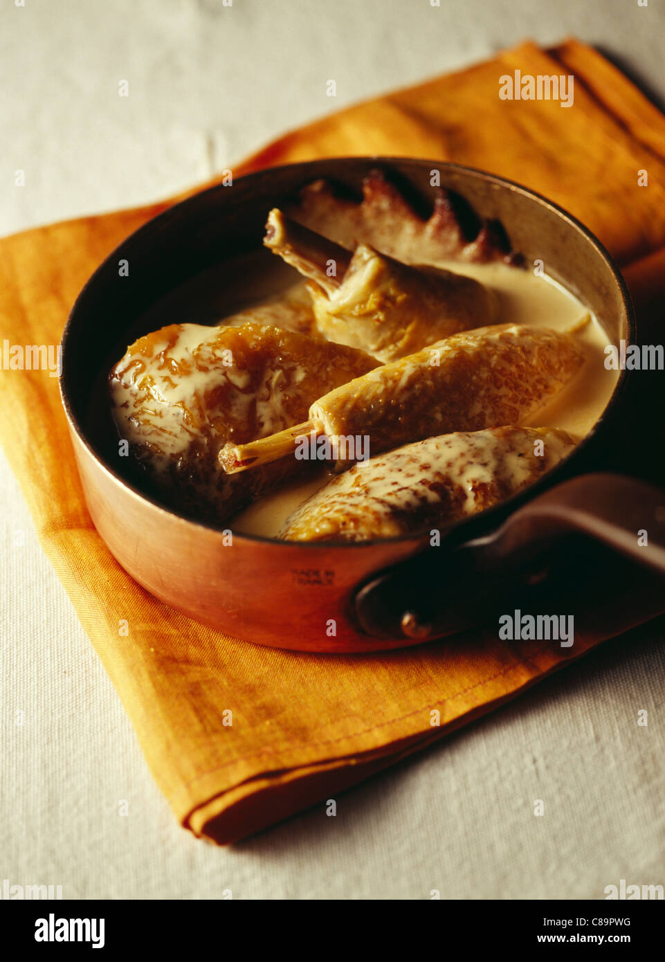 Bresse poulard hen in creamy sauce Stock Photo