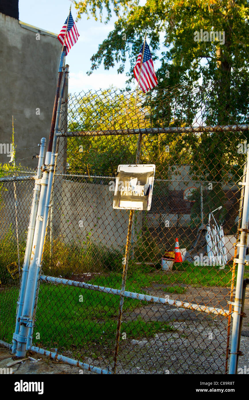 American flags on a fence in Brooklyn, New York Stock Photo