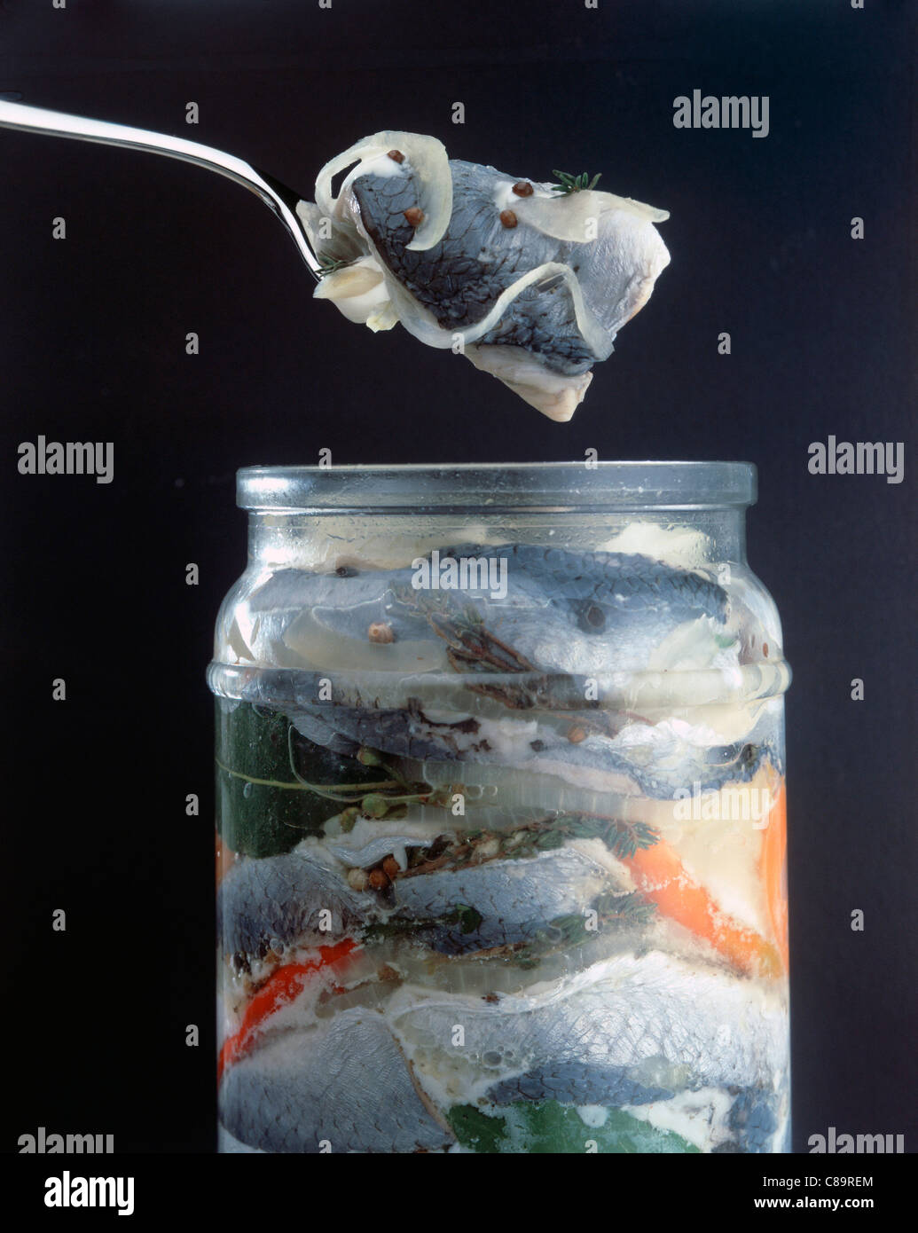 Pickled herrings in jar Stock Photo Alamy
