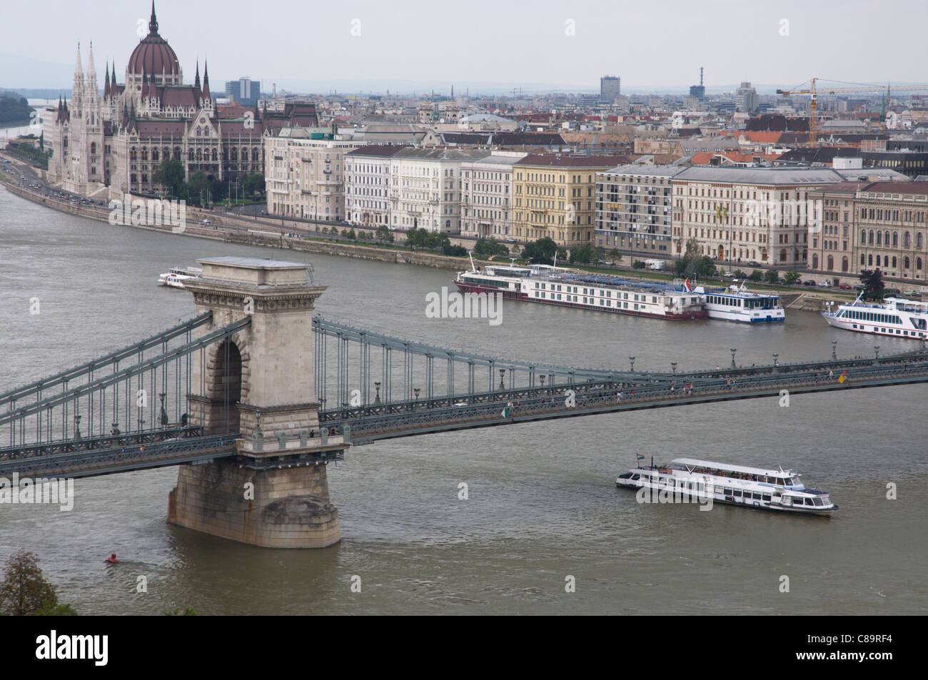 Danube riverside views at Szechenyi Lanchid the Chain bridge Budapest Hungary Europe Stock Photo