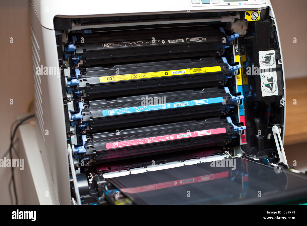 Toner cartridges in HP color Laserjet 2605DN printer Stock Photo - Alamy