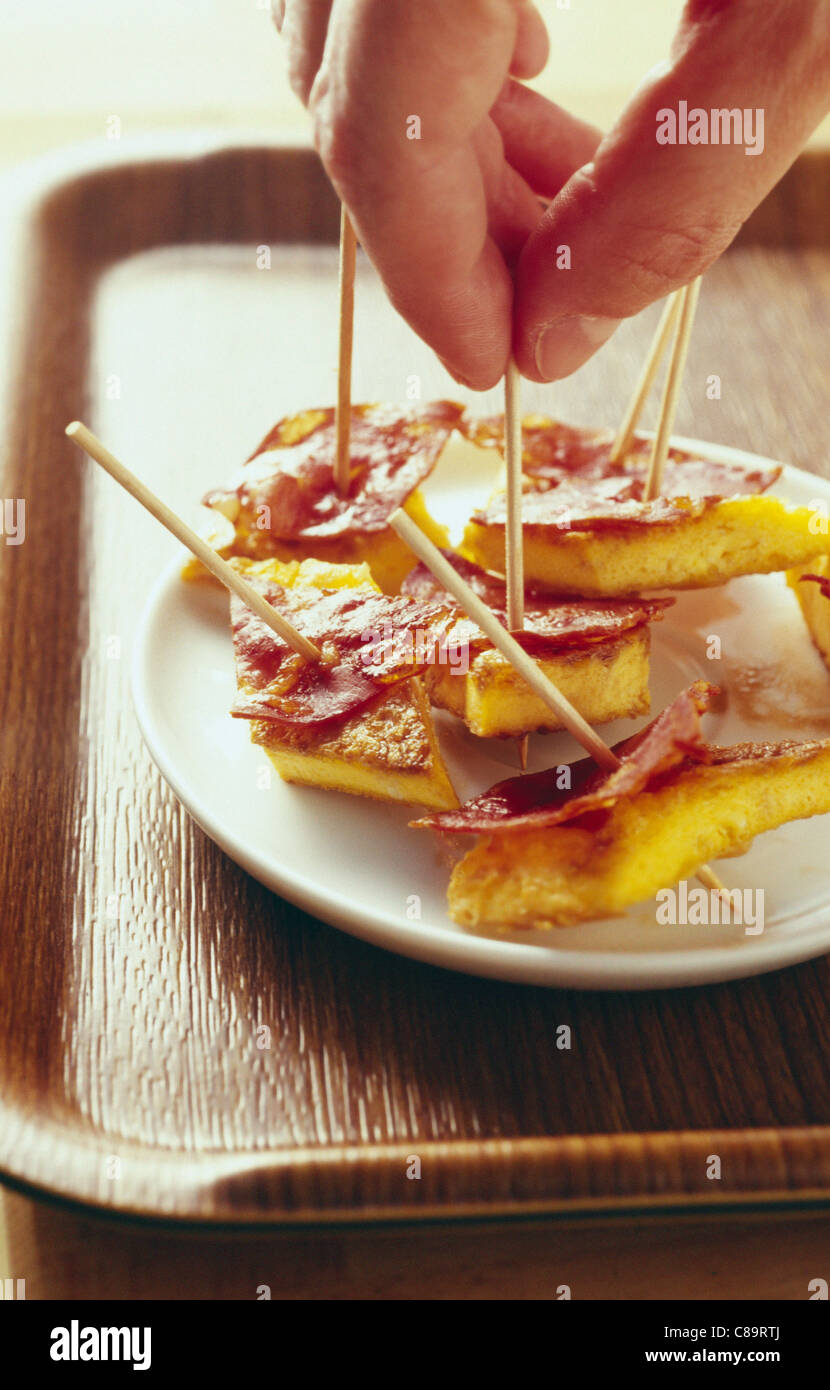 Omelette with chorizo appetizers Stock Photo Alamy