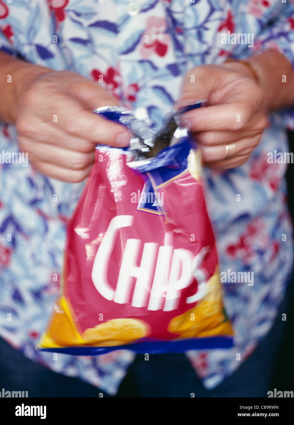 Opening a bag of crisps hires stock photography and images Alamy