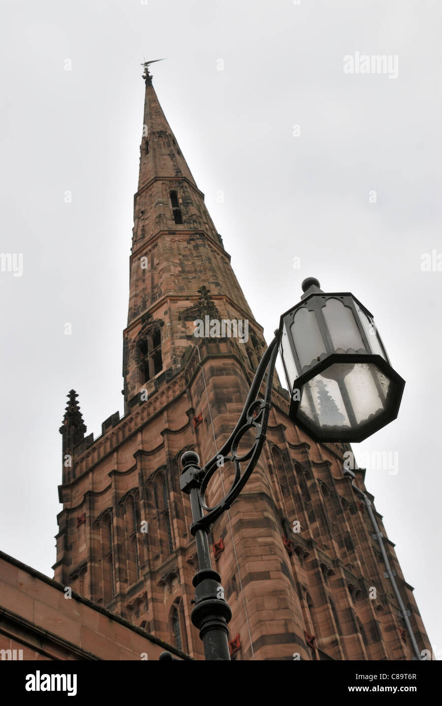 View of old religious architecture of the present church spire, Coventry Stock Photo
