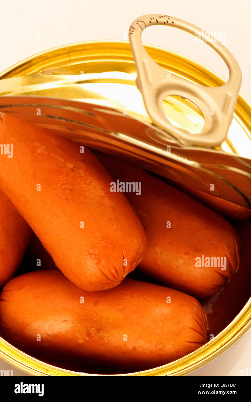 Cocktail sausages in tin Stock Photo Alamy